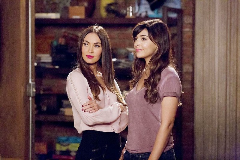 Megan Fox (left) stars with Hannah Simone in a four-episode arc of New Girl while series star Zooey Deschanel is on maternity leave.