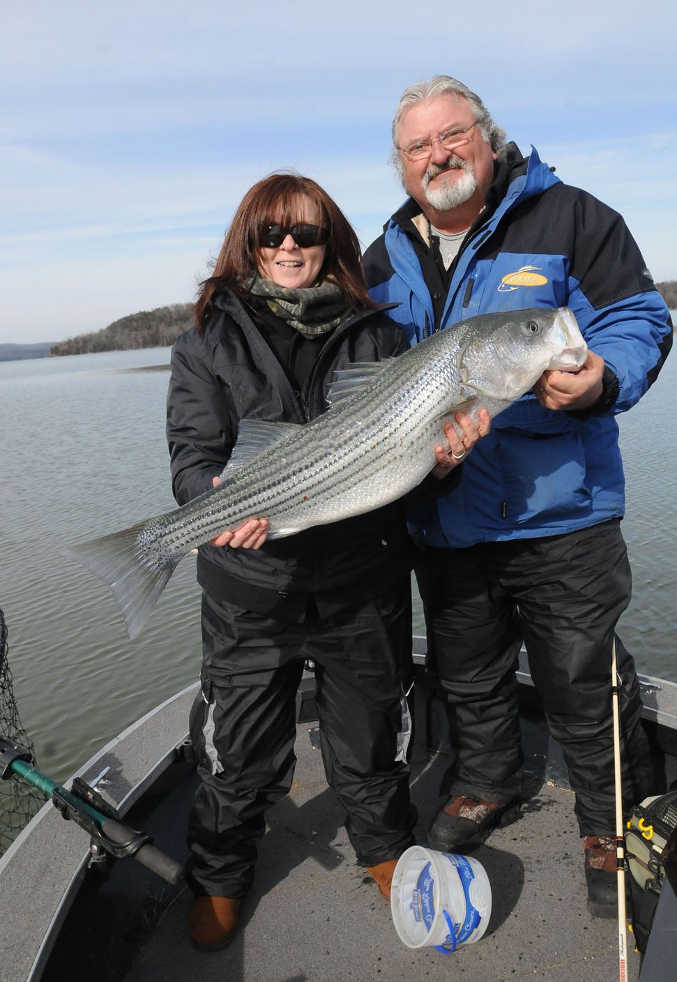 VIDEO Couple teams up on big stripers