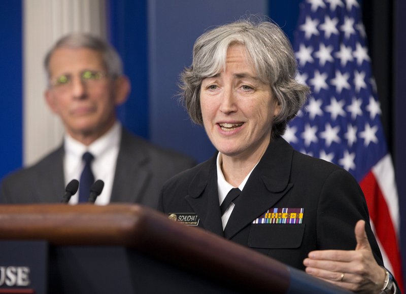Dr. Anne Schuchat, principal deputy director of the Centers for Disease Control and Prevention, speaks to the media Monday at the White House as Dr. Anthony Fauci, director of the National Institute of Allergy and Infectious Disease, listens.