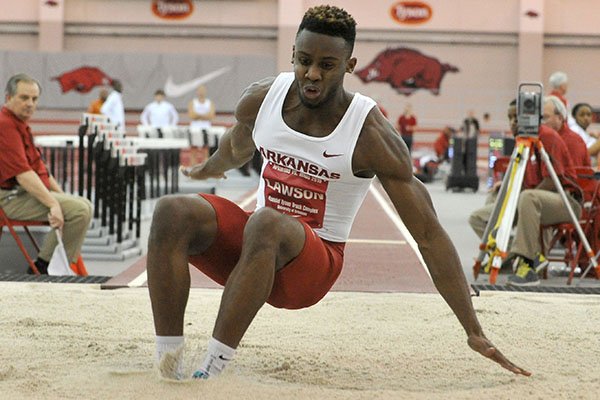 Arkansas jumper Jarrion Lawson competes during the Razorbacks' dual meet against Texas on Friday, Jan. 17, 2015, at Randal Tyson Track Center in Fayetteville. 