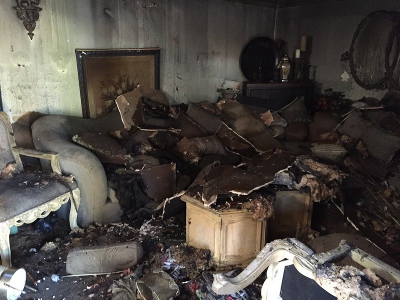 Damage is seen in the interior of a house at 2701 Fair Park Blvd. in Little Rock after a fire claimed the lives of two residents who were inside at the time.