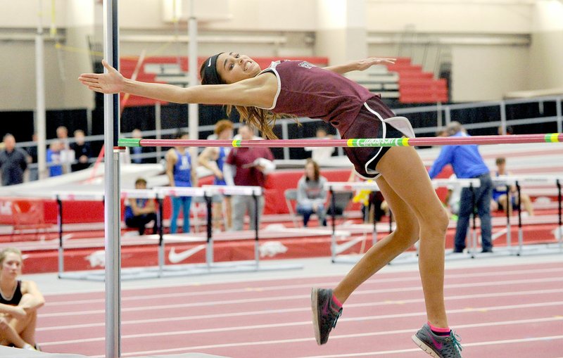 Michael Woods/NWA Democrat-Gazette Siloam Springs senior Alexis Duffy won the state championship in the girls high jump at the 5A-7A State Indoor track meet Saturday at the Tyson Indoor Sports Complex in Fayetteville. Duffy finished first with a jump of 5 feet, 4 inches.