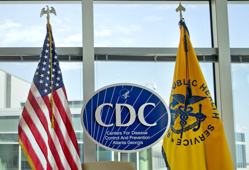 In this Nov. 19, 2013, file photo, the Centers for Disease Control and Prevention sign is photographed at the agency's federal headquarters in Atlanta.