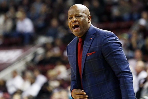 Arkansas head coach Mike Anderson shouts instructions to his team in the first half of an NCAA college basketball game against Mississippi State in Starkville, Miss., Tuesday, Feb. 9, 2016. Mississippi State won 78-46. (AP Photo/Rogelio V. Solis)
