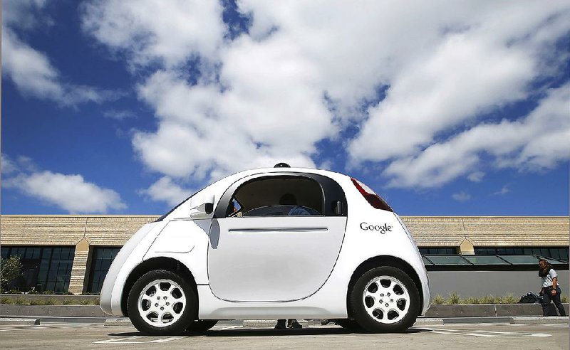 Google’s new self-driving car is displayed during a demonstration at the Google campus in Mountain View, Calif., in this file photo. 