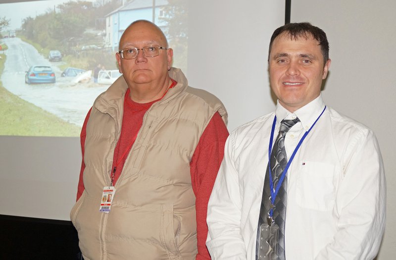 RITA GREENE MCDONALD COUNTY PRESS Pineville Mayor Gregg Sweeten, director, from left, McDonald County Emergency Management, and Doug Cramer, meteorologist, from the National Weather Service in Springfield, Mo., who conducted Storm Spotter Training at the Pineville Community Center Monday, Feb. 8.