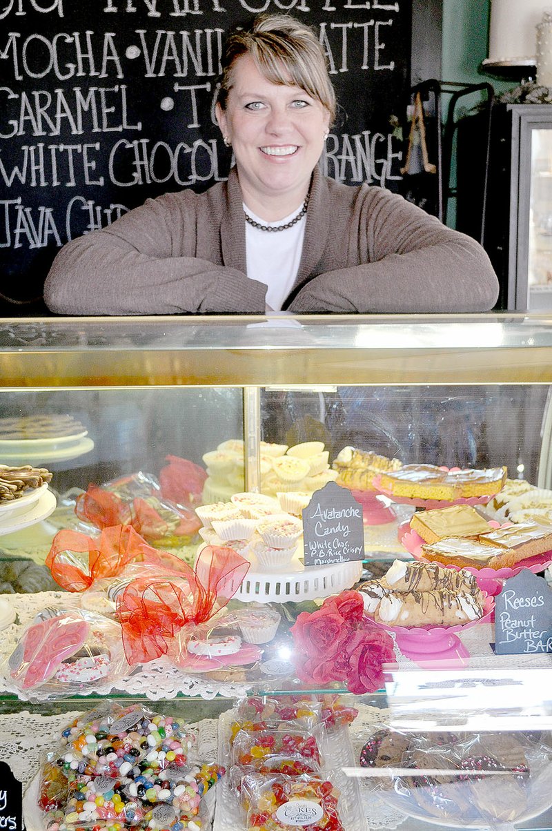 Rachel Dickerson McDonald County Press Rhonda Jones of Main Sweets Bakery is pictured with a case full of sweets. Jones has been preparing for Valentine&#8217;s Day, her busiest time of the year.