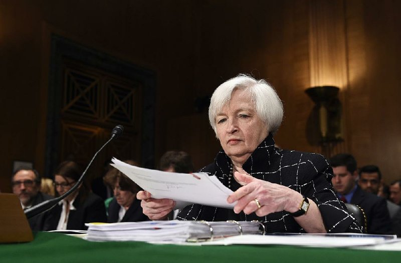 Federal Reserve Chairman Janet Yellen prepares to testify Thursday on Capitol Hill, where she said the Fed has been surprised by the drop in energy prices.