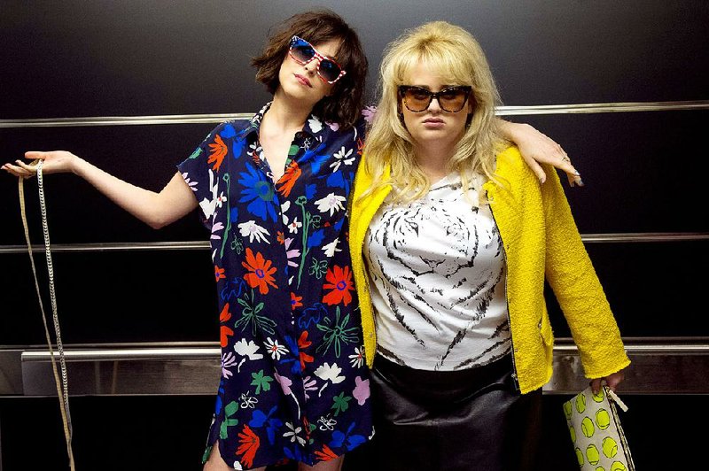 Alice (Dakota Johnson) and Robin (Rebel Wilson) are living the wild life in Manhattan in the anti-romantic comedy How to Be Single.
