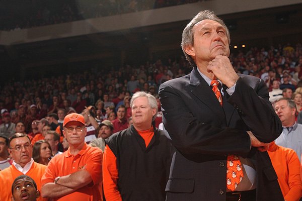 Oklahoma State coach Eddie Sutton is introduced prior to a game against Arkansas on Saturday, Dec. 20, 2003, at Bud Walton Arena in Fayetteville. 