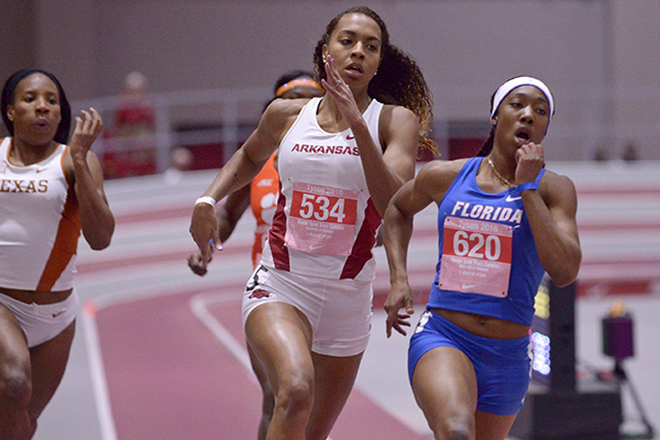 WholeHogSports - Tough foe pushes Ellis-Watson to victory in 400