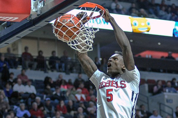 Mississippi forward Marcanvis Hymon (5) dunks against Auburn during the second half of an NCAA college basketball game at the Pavilion at Ole Miss on Wednesday, Jan. 27, 2016 in Oxford, Miss.. (Bruce Newman/The Oxford Eagle via AP)