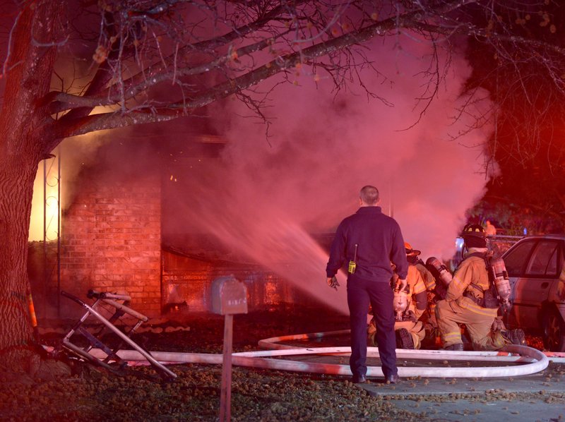 One person was injured in a house fire Thursday night in Rogers.