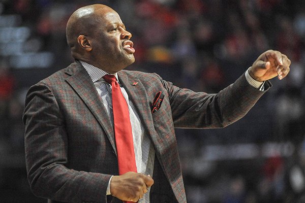 Arkansas head coach Mike Anderson reacts against Mississippi during an NCAA college basketball game on Saturday, Feb. 13, 2016, in Oxford, Miss. (Bruce Newman /The Oxford Eagle via AP)