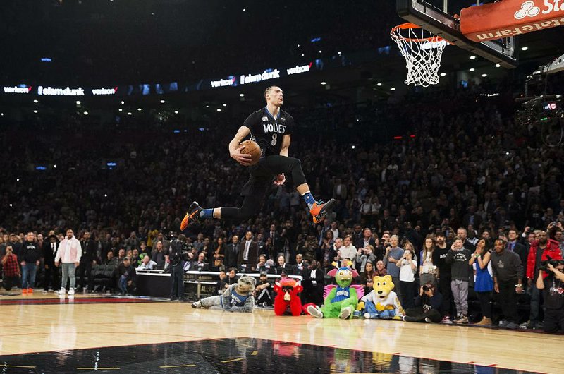 Minnesota’s Zach LaVine outdueled Orlando’s Aaron Gordon to win his second consecutive slam dunk title Saturday night.