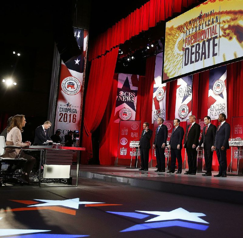 The Republican presidential candidates pause at the start of their debate Saturday in Greenville, S.C., for a moment of silence in honor of deceased Supreme Court Justice Antonin Scalia. 