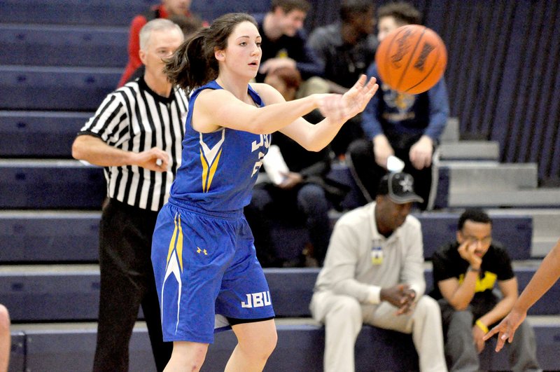 Photo courtesy of Texas Wesleyan John Brown University freshman Baily Cameron looks to pass the ball during Thursday&#8217;s game at Texas Wesleyan. Cameron scored 25 points in the Golden Eagles&#8217; 84-73 victory.