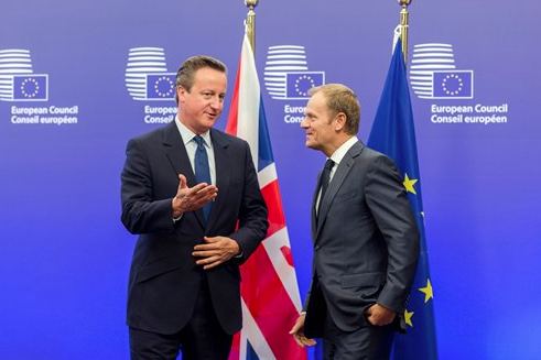 European Council President Donald Tusk, right, welcomes British Prime Minister David Cameron, left, upon his arrival at the EU Council building in Brussels on Thursday, Sept. 24, 2015. European leaders will discuss Britain's possible departure from the EU and other problems facing the 28-nation bloc during a summit Thursday, Feb. 18, 2016. 