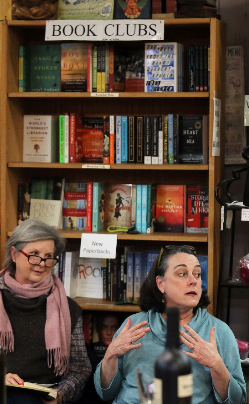 Judy Johnson (left) and Mim Hundley are members of a book club at WordsWorth Books & Co. in Little Rock, and recently discussed Richard Russo’s Straight Man, a comic novel about the pitfalls of university life.