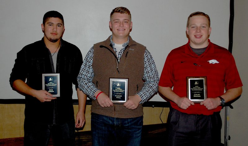 Graham Thomas/Herald-Leader Siloam Springs had three players named All-Conference honorable mention from the 7A/6A-Central Conference for the 2015 season. Pictured are, from left, senior defensive lineman Kris Green, senior center Parker Hall and senior offensive lineman Colby Brown.
