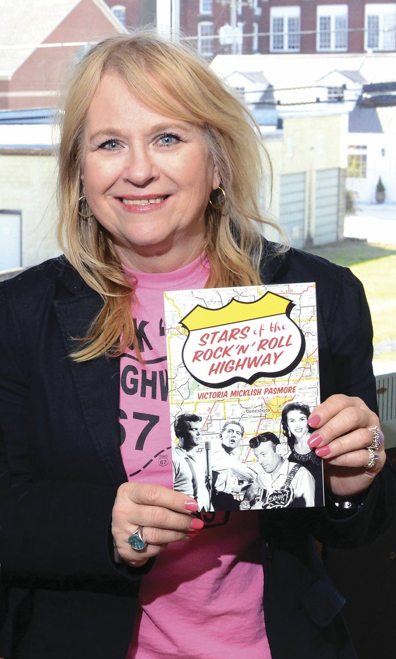 Victoria “Vicki“ Pasmore is shown holding her recently published book, Stars of the Rock ’n’ Roll Highway. The nonfiction work explores the musicians who performed along U.S. 67, now known as Rock ‘n’ Roll Highway 67.