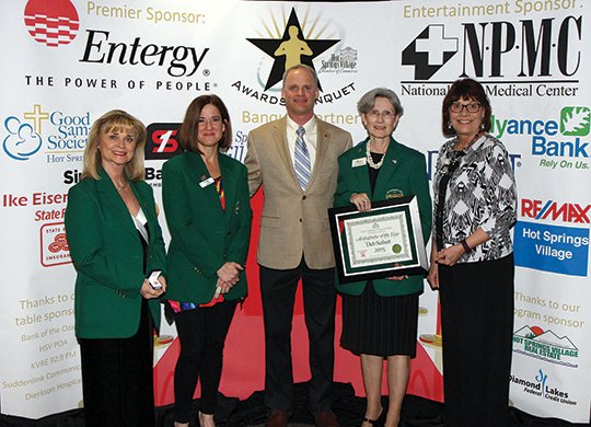 The Sentinel-Record/Lorien E. Dahl AMBASSADOR AWARDS: The Hot Springs Village Area Chamber of Commerce honored Chamber Ambassadors, from left, Carole Lacey and Carol Cook, who each received bronze star pins, award sponsor Ike Eisenhauer State Farm, Ambassador of the Year Deb Seibert of Hot Springs Village Real Estate, and Becky Elderton, who earned a gold star pin.