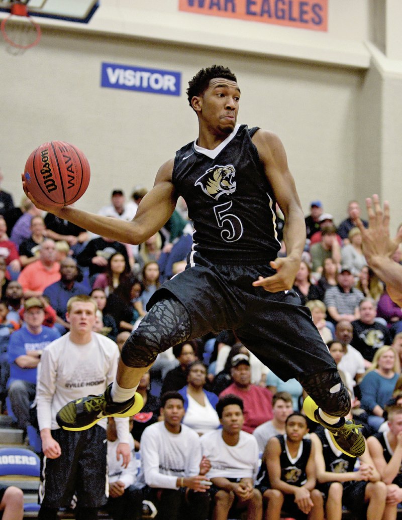 Malik Monk of Bentonville passes Friday at King Arena in Rogers.