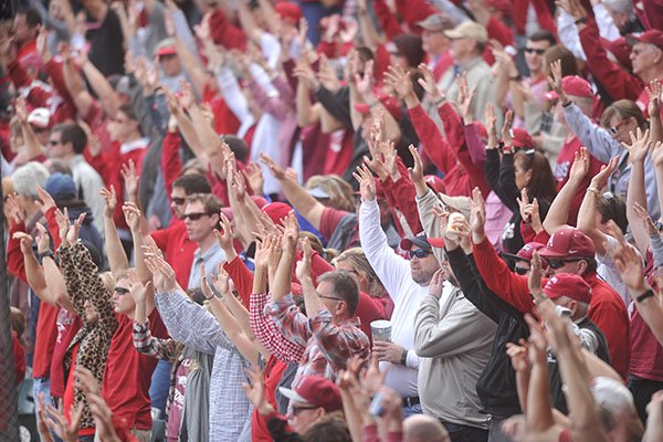 Arkansas fans call the Hogs during a game against Central Michigan on Saturday, Feb. 20, 2016, at Baum Stadium in Fayetteville. 