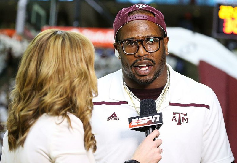 Super Bowl 50 MVP Denver Bronco linebacker Von Miller is interviewed by ESPN before the start of an NCAA college basketball game between Kentucky and Texas A&M, Saturday, Feb. 20, 2016, in College Station, Texas.  
