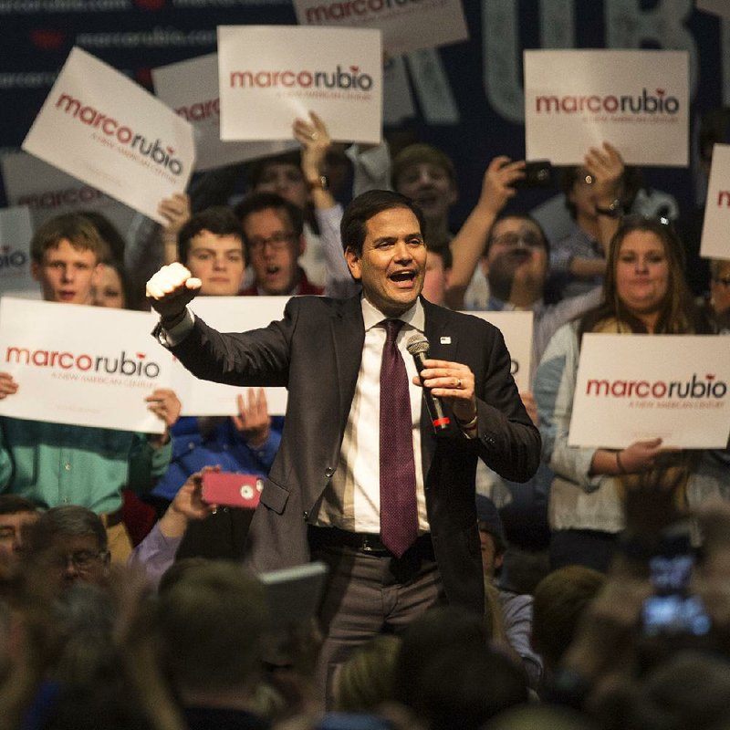 Republican presidential candidate Marco Rubio says goodbye to a crowd of about 2,000 people after giving a campaign speech Sunday evening at the Statehouse Convention Center in Little Rock.