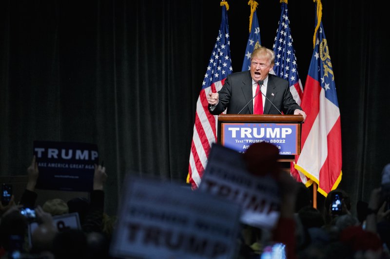 In this Feb. 21, 2016 file photo, Republican presidential candidate Donald Trump speaks at a campaign event in Atlanta.