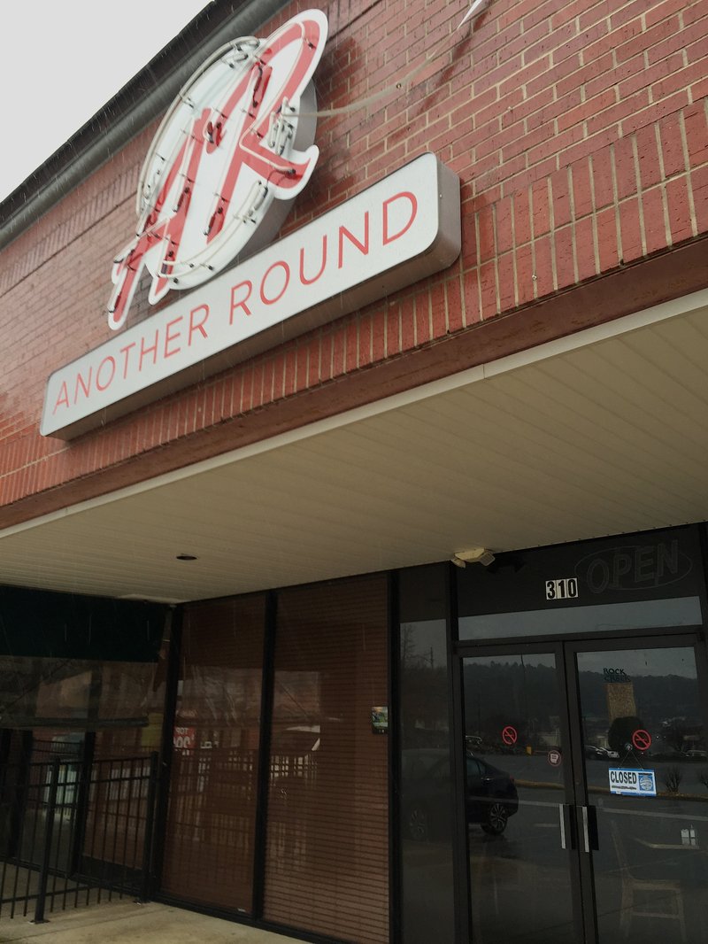Only a "closed" sign marks the end of business for Another Round Pub at 12111 W. Markham St. in west Little Rock. The bar and concert venue announced its closure via Facebook earlier this week.