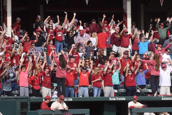 Arkansas fans call the Hogs during the Razorbacks' game against Central Michigan on Sunday, Feb. 21, 2016, at Baum Stadium in Fayetteville.