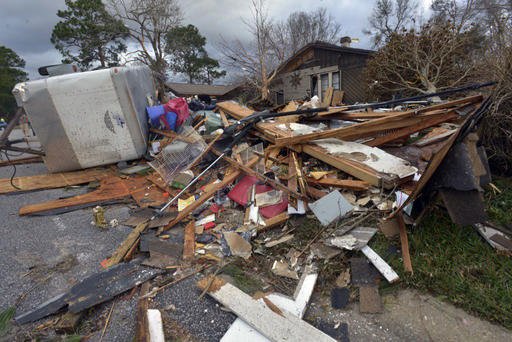 Tornadoes ravage South; threat remains for more twisters