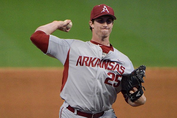 Arkansas' Dominic Taccolini throws a pitch during a game against Rice on Friday, Feb. 26, 2016, at Minute Maid Park in Houston. 