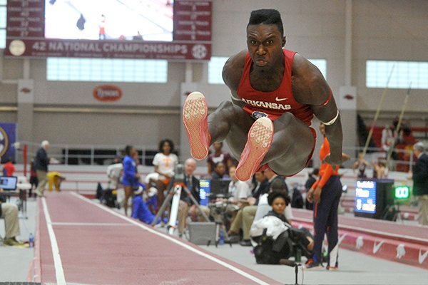 Arkansas' Clive Pullen competes in the finals of the triple jump competition during the SEC Indoor Championships on Saturday, Feb. 27, 2016, at Randal Tyson Track Center in Fayetteville. 