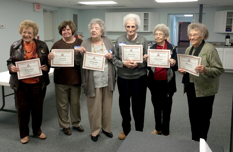 Submitted Photo Ladies who had been members of Extension Homemakers over 50 years were honored at the Benton County EH Club end-of-year luncheon. Pictured with their award certificates are Marjorie Shafer of Bella Vista, Lavon Stark of Gravette, Orpha Wardlaw of Maysville and Delores Cook of Bella Vista, 50 year members; Katherine Tucker of Gravette, 60 year member; and Millie Peters of Rogers, 72 year member. Jewel Crawley of Maysville, a 60 year member, was not present.