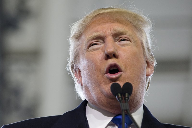 Republican presidential candidate Donald Trump speaks during a campaign stop at the Signature Flight Hangar at Port-Columbus International Airport, Tuesday, March 1, 2016, in Columbus, Ohio. (AP Photo/John Minchillo)
