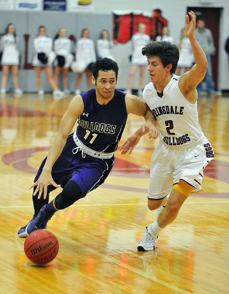 Senior point guard Spencer Brown (left) doesn’t put up big numbers for Fayetteville — he is averaging 7.3 points and 2.4 assists per game — but he provides plays that do not show up in the box score. “He’s like having a coach out there on the •oor, and he’s so valuable,” Fayetteville Coach Kyle Adams said. 