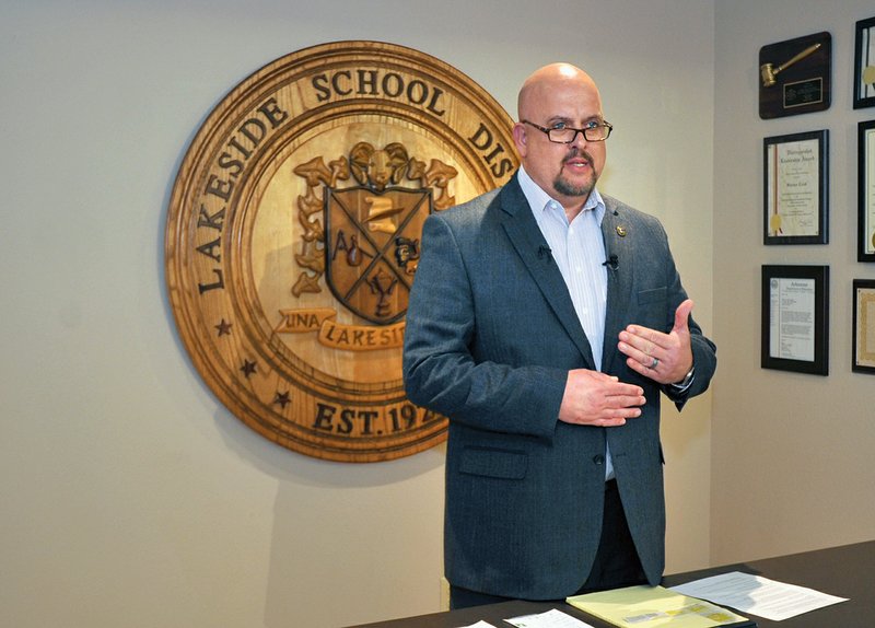 The Sentinel-Record/Mara Kuhn NEWS CONFERENCE: Lakeside School District Superintendent Shawn Cook speaks at a news conference about the alleged rape of a female student in Ram Field House last week.