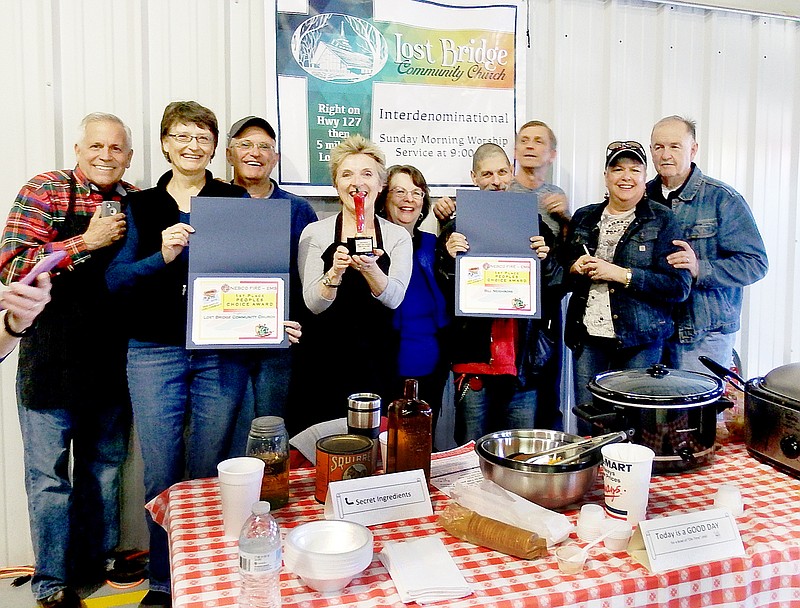TIMES photograph by Annette Beard Lost Bridge Community Church earned first place in the People&#8217;s Choice for the 12th annual Chili Cook-off sponsored by the Northeast Benton County Volunteer Fire Department Saturday. See pg. 6A for more.