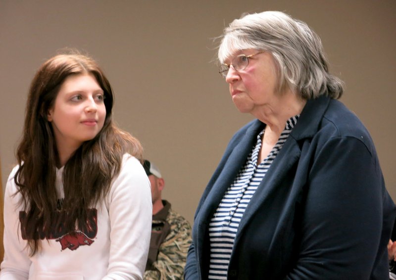 Photo by Susan Holland Hannah Bruckner, left, an exchange student from Austria, and her host parent, Karen Kerr, attended the February meeting of the Gravette school board and gave a short presentation. Hannah is a junior at Gravette High School and has been in the United States less than two months. She is the 10th exchange student that Kerr has hosted.