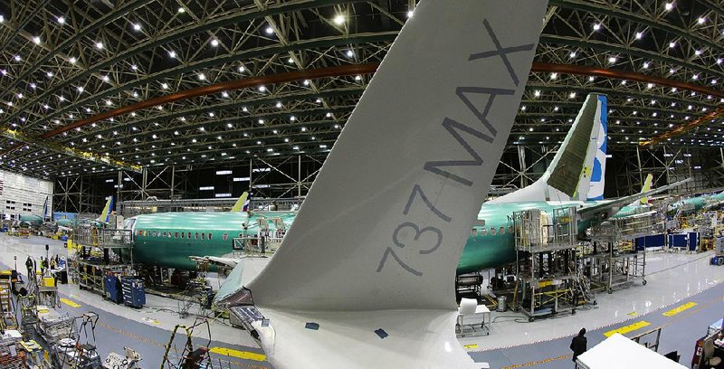 Work continues on a Boeing 737-Max on the assembly line in Renton, Wash., in this file photo. The Commerce Department on Thursday said orders to U.S. factories jumped in January. 
