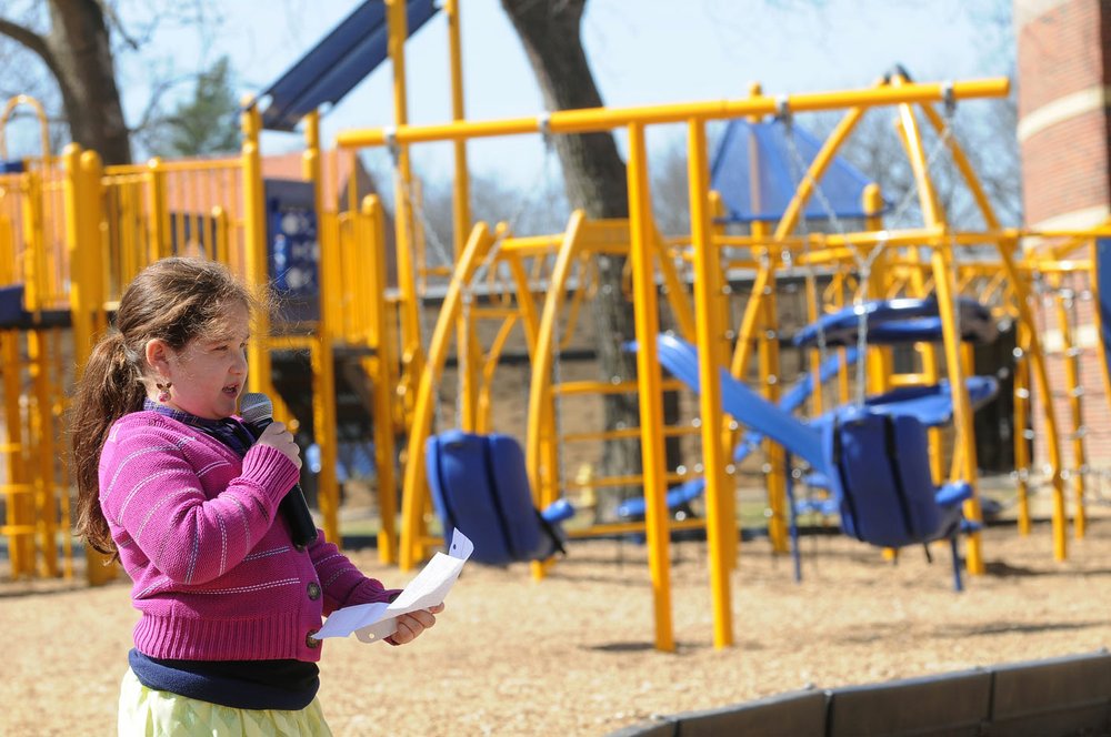 Bentonville school celebrates new swings