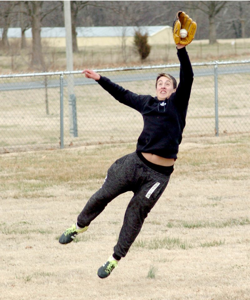 Photo by Mike Eckels David Lopez catches a high throw from one of his teammates during a Decatur High School baseball practice session at Edmiston Park in Decatur Feb. 22. The high school baseball season begins March 29 at home.