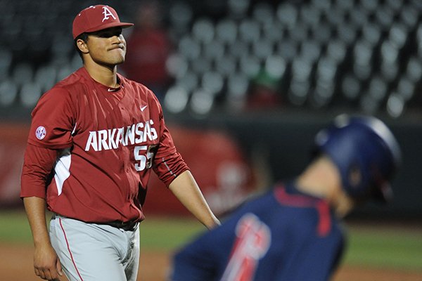 Arkansas relief pitcher Isaiah Campbell reacts to after hitting a batter with the bases-loaded against Gonzaga Wednesday, March 9, 2016, during the ninth inning at Baum Stadium in Fayetteville. 