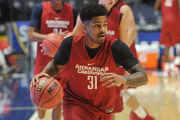 Arkansas' Anton Beard goes through practice Wednesday, March 9, 2016, at Bridgestone Arena in Nashville, Tenn. 