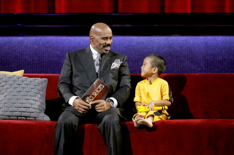 Host Steve Harvey chats with pint-size nunchucks master Ryusei Imai on NBC’s new Little Big Shots.