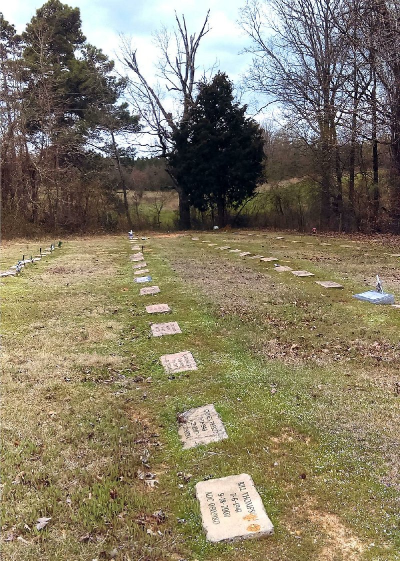 Prison-made headstones mark the graves of about 130 inmates, unclaimed by family or loved ones, at Leek/Drake Cemetery outside Star City.