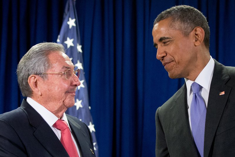 In this Sept. 29, 2015 file photo, President Barack Obama stands with Cuba's President Raul Castro before a bilateral meeting at the United Nations headquarters. President Barack Obama will use his historic trip to Cuba to chip away at key remaining U.S. obstacles to travel and commerce with the communist island, working to push his rapprochement past the point of no return before he leaves office. 